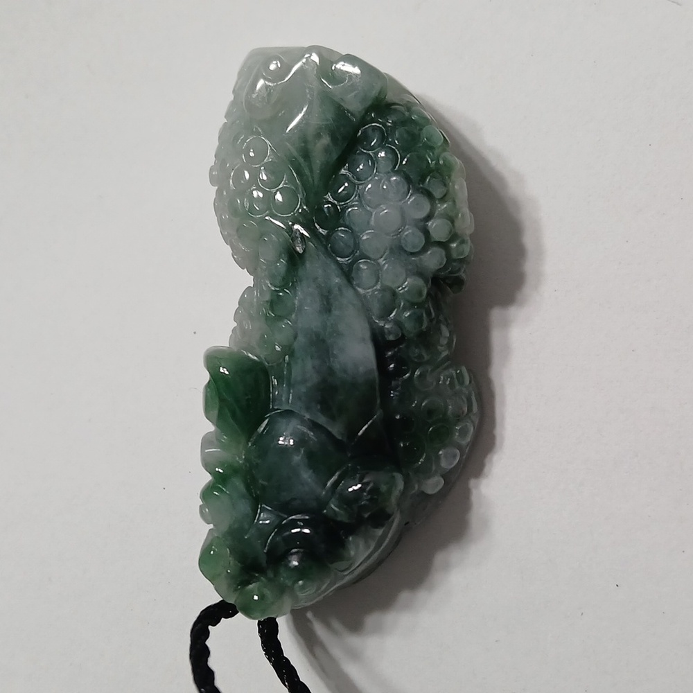 Jade lucky coin lion carving